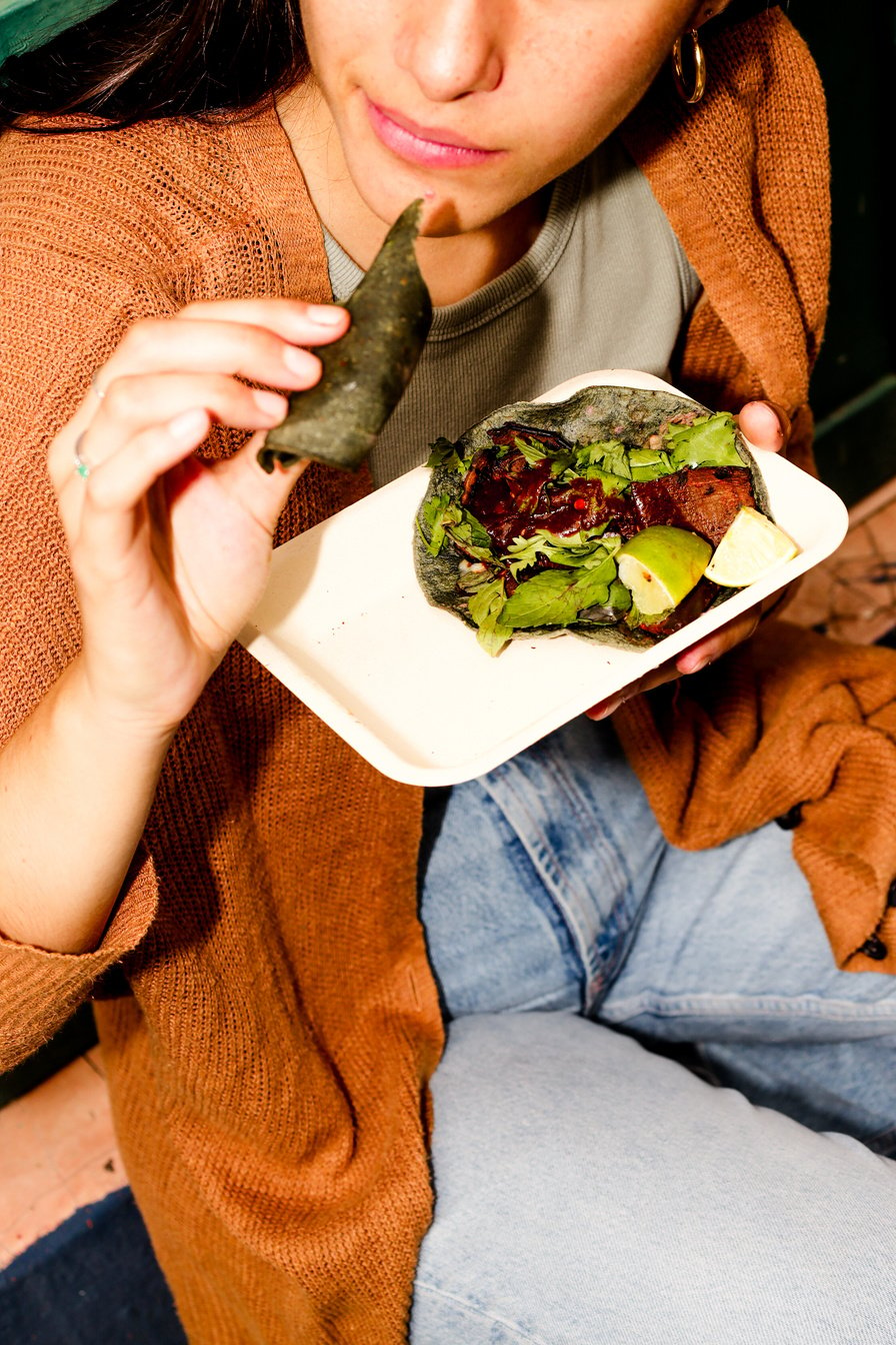 Woman Eating Vegetarian Meal